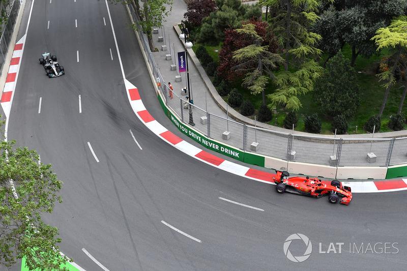 Sebastian Vettel, Ferrari SF71H and Lewis Hamilton, Mercedes-AMG F1 W09 EQ Power