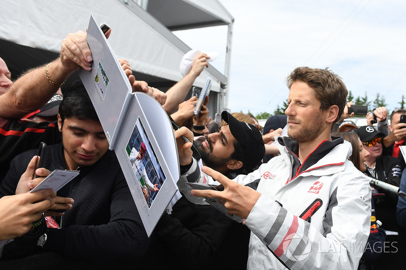 Romain Grosjean, Haas F1 signs autographs for the fans