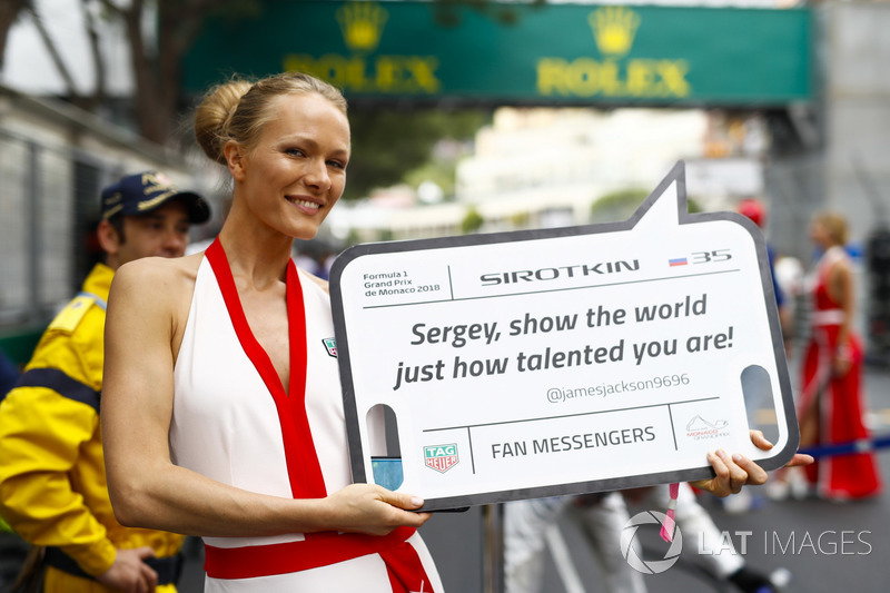 Models display messages from fans on the grid