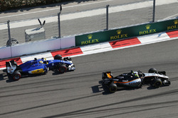 Sergio Perez, Sahara Force India F1 VJM09 leads Marcus Ericsson, Sauber C35