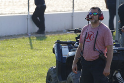 Tony Stewart watches the practice from the infield
