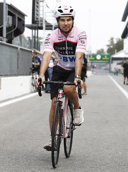 Sergio Perez, Force India, on a bicycle