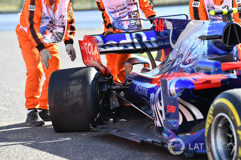 The damaged car of race retiree Carlos Sainz Jr., Scuderia Toro Rosso STR12