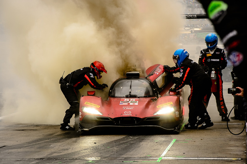 2. #55 Mazda Motorsports Mazda DPi: Jonathan Bomarito, Tristan Nunez, Spencer Pigot, on fire in the pits