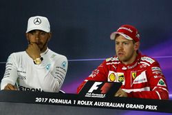 Sebastian Vettel, Ferrari; Lewis Hamilton, Mercedes AMG F1