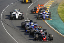 Kevin Magnussen, Haas F1 Team VF-17, leads Marcus Ericsson, Sauber C36, Antonio Giovinazzi, Sauber C36, Stoffel Vandoorne, McLaren MCL32, Lance Stroll, Williams FW40, and Jolyon Palmer, Renault Sport F1 Team RS17, at the start