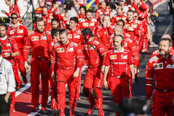 Ferrari engineers head to Parc Ferme to celebrate victory