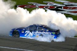 Martin Truex Jr., Furniture Row Racing Toyota celebrates his win with a burnout