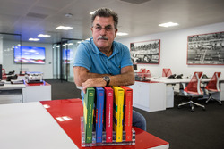 Rainer W. Schlegelmilch poses in the Motorsport Network office
