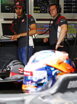 Antonio Giovinazzi, Haas F1 Team test driver, observes Romain Grosjean, Haas F1 Team