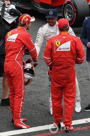 Sebastian Vettel, Ferrari, Lewis Hamilton, Mercedes AMG F1 and Kimi Raikkonen, Ferrari celebrate in 