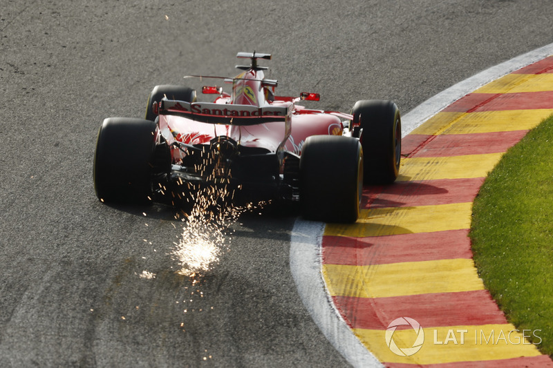 Sebastian Vettel, Ferrari SF70H, strikes up sparks