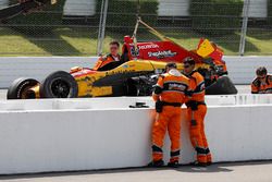 Ryan Hunter-Reay, Andretti Autosport Honda, is helped out of his car by the Holmatro Safety Team after crash