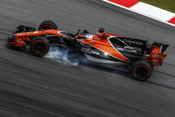 Fernando Alonso, McLaren MCL32 bloque une roue
