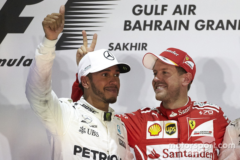 Podium: race winner Sebastian Vettel, Ferrari, second place Lewis Hamilton, Mercedes AMG F1