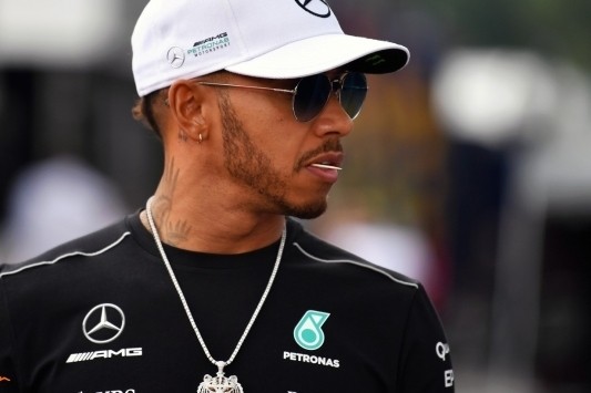 Hamilton en Vettel verkiezen huidige teammaat boven Alonso