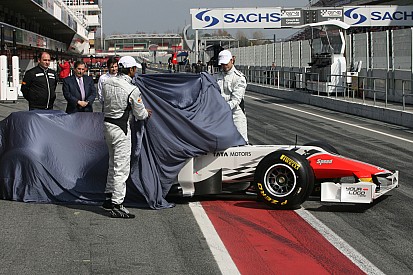 HRT reveal F111, Schumacher flies, Dennis in trouble