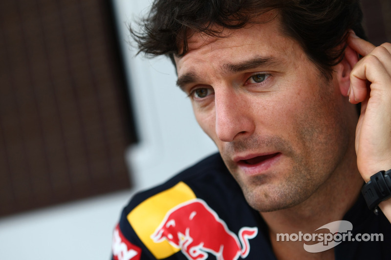 Webber enjoys wheelie on Grand Prix motorbike