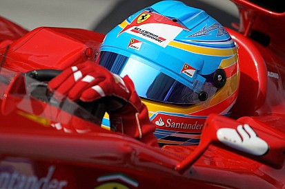 Alonso F1's shock leader at soggy Sepang