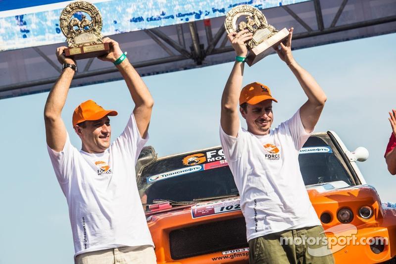 Through the rain the locals shine - Silk Way Rally