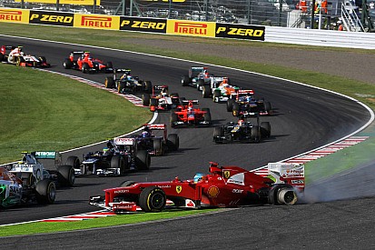Japanese GP - Massa magnificent as Alonso is pushed off and out