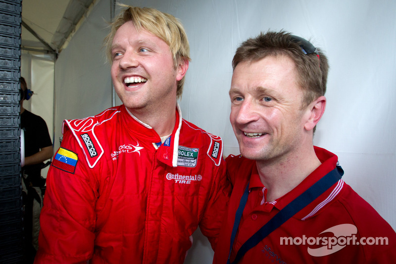 Pole winner Ryan Dalziel celebrates with Allan McNish