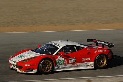 Sweedler and Bell look forward Lime Rock Park in their Ferrari