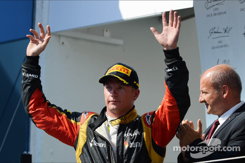 Kimi Raikkonen, Lotus F1 Team celebrates his second position on the podium