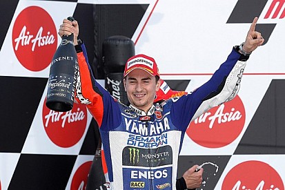 Lorenzo keeps championship hopes alive with victory in Japan