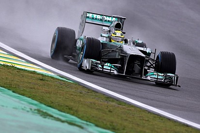 Rosberg retains top spot in rainy Brazil's second practice