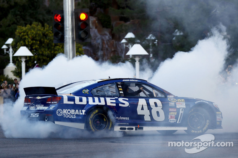 Jimmie Johnson performs a burnout during NASCAR Victory Lap