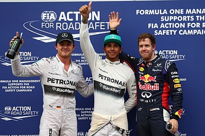 Hamilton grabs pole in soaking Sepang qualifying