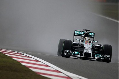 Lewis Hamilton claims pole-position for Mercedes in wet qualifying at Shanghai