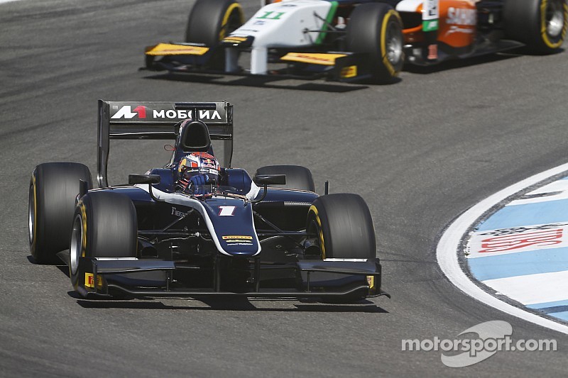 Evans hangs on to win dramatic 200th feature race at Hockenheim
