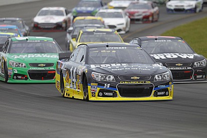 Stewart returns in emotionally charged press conference