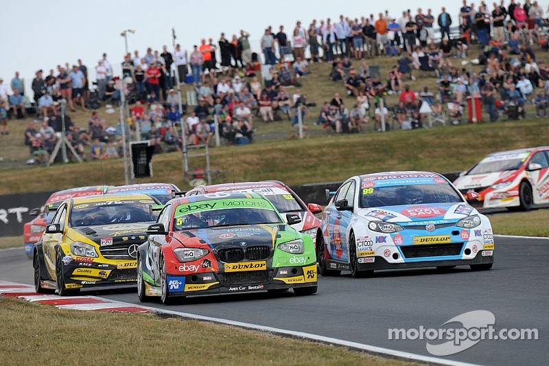 Colin Turkington edges closer to title as Rob Austin claims first win of 2014