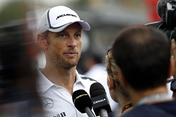 McLaren 'happy' to keep Button for 2015