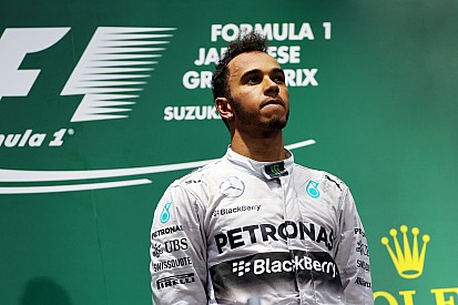 Mercedes’ Lewis Hamilton wins safety car and rain delayed Japanese Grand Prix
