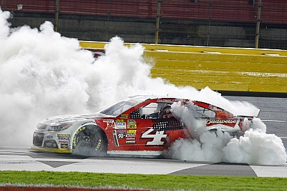 Harvick wins at Charlotte as brawl breaks out in garage
