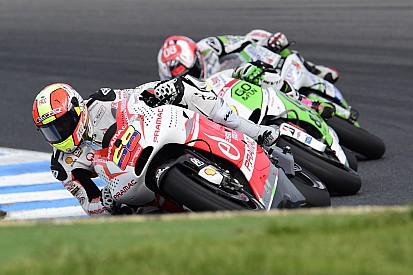 Yonny Hernandez celebrates his fiftieth race finishing seventh, his best result in MotoGP