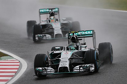 Rosberg happy with heavy Brazil rain