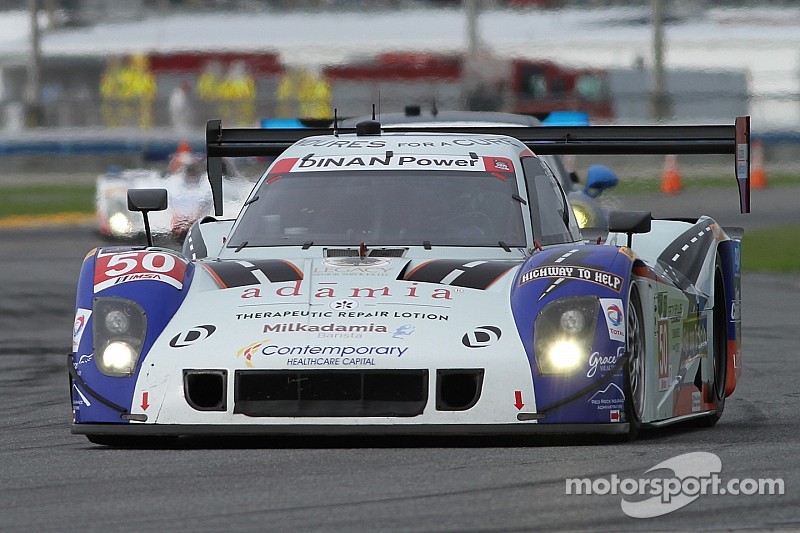 Doran Racing crew is hard at work repairing Fifty Plus Racing prototype after spectacular crash