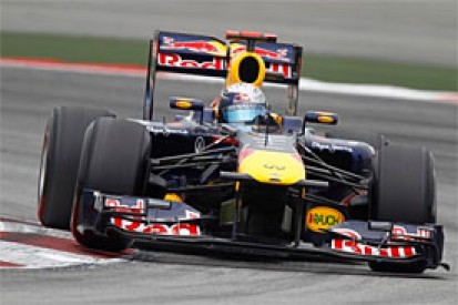 Vettel eases to Malaysian GP victory