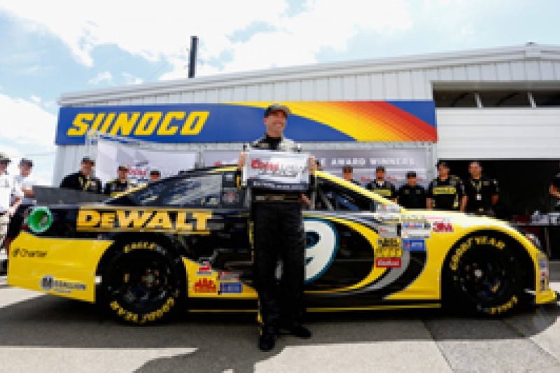 Watkins Glen NASCAR: Marcos Ambrose claims pole