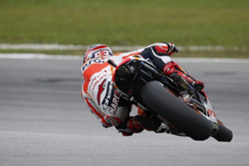 Sepang MotoGP: Marc Marquez denies Valentino Rossi pole as rain hits