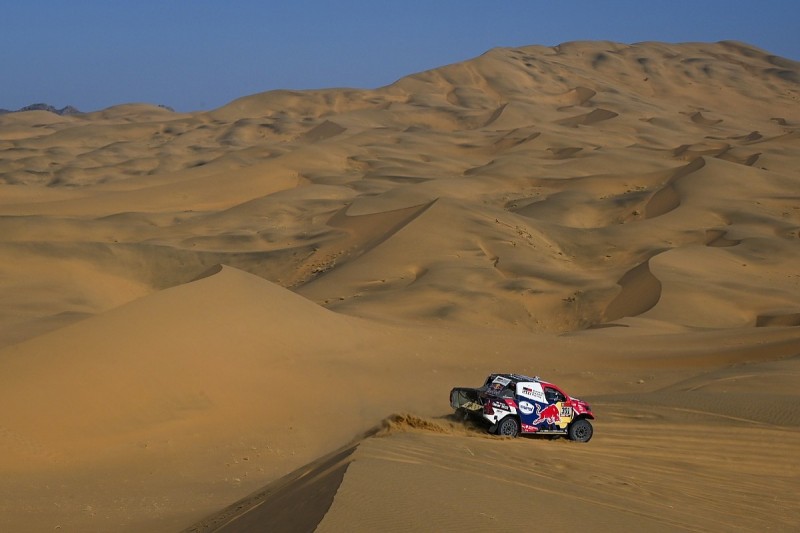 Al-Attiyah trims gap to Dakar leader Peterhansel with hat-trick stage win