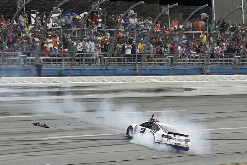 Brad Keselowski hangs on for victory in chaotic Talladega race