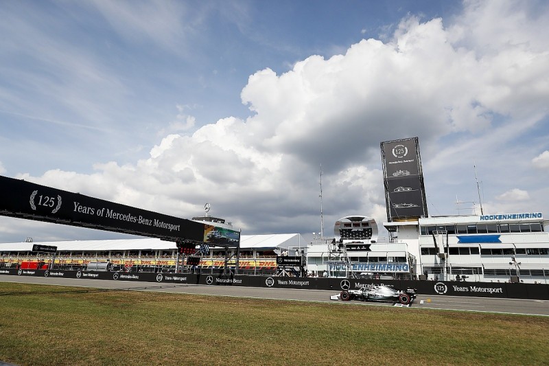Hamilton takes F1 German GP pole, both Ferraris forced out early