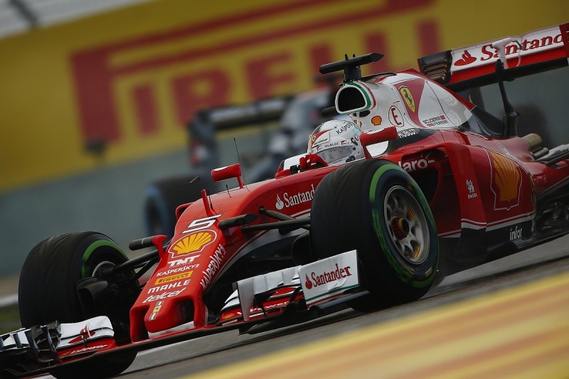 Ferrari's Sebastian Vettel fastest in wet final Chinese GP practice