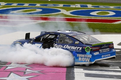 NASCAR Charlotte: Martin Truex Jr wins in overtime, into last eight